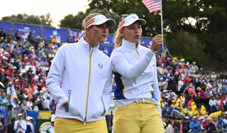 Charley Hull and Emily Pedersen in discussion during the 2023 Solheim Cup