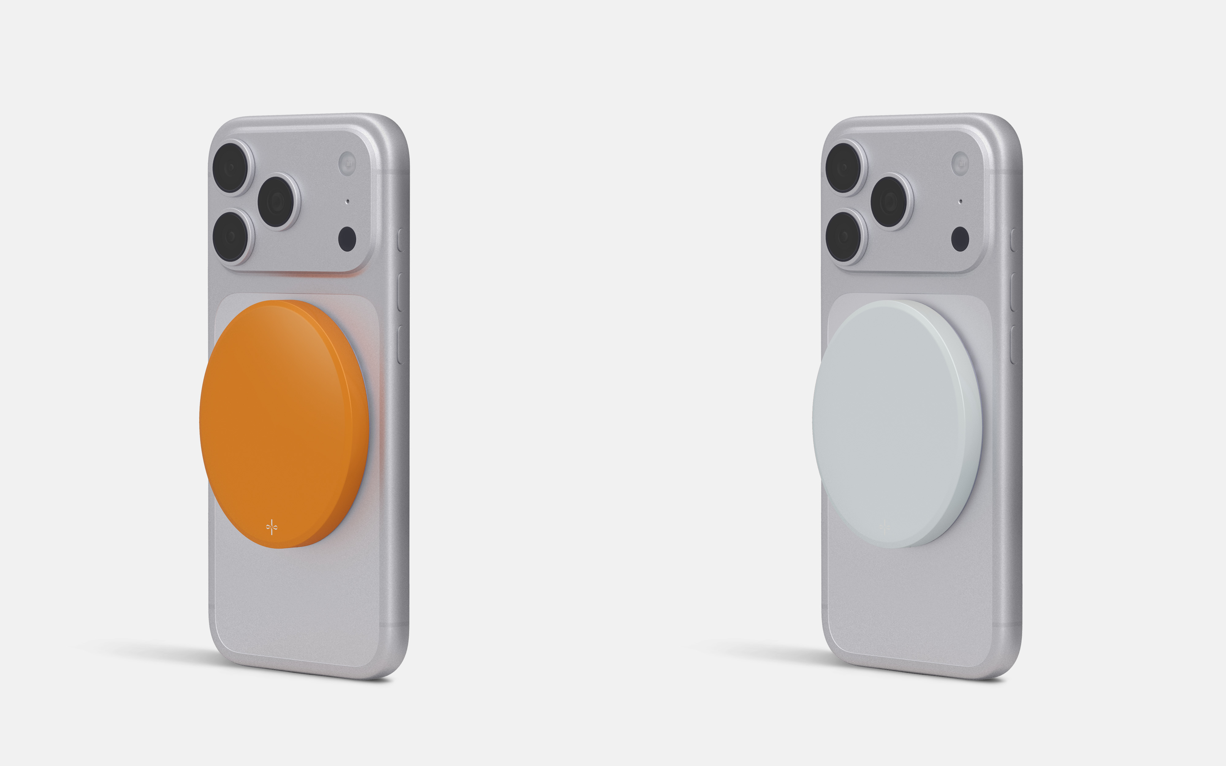 Alma wireless charger by Addition in Sol Orange and Arctic White