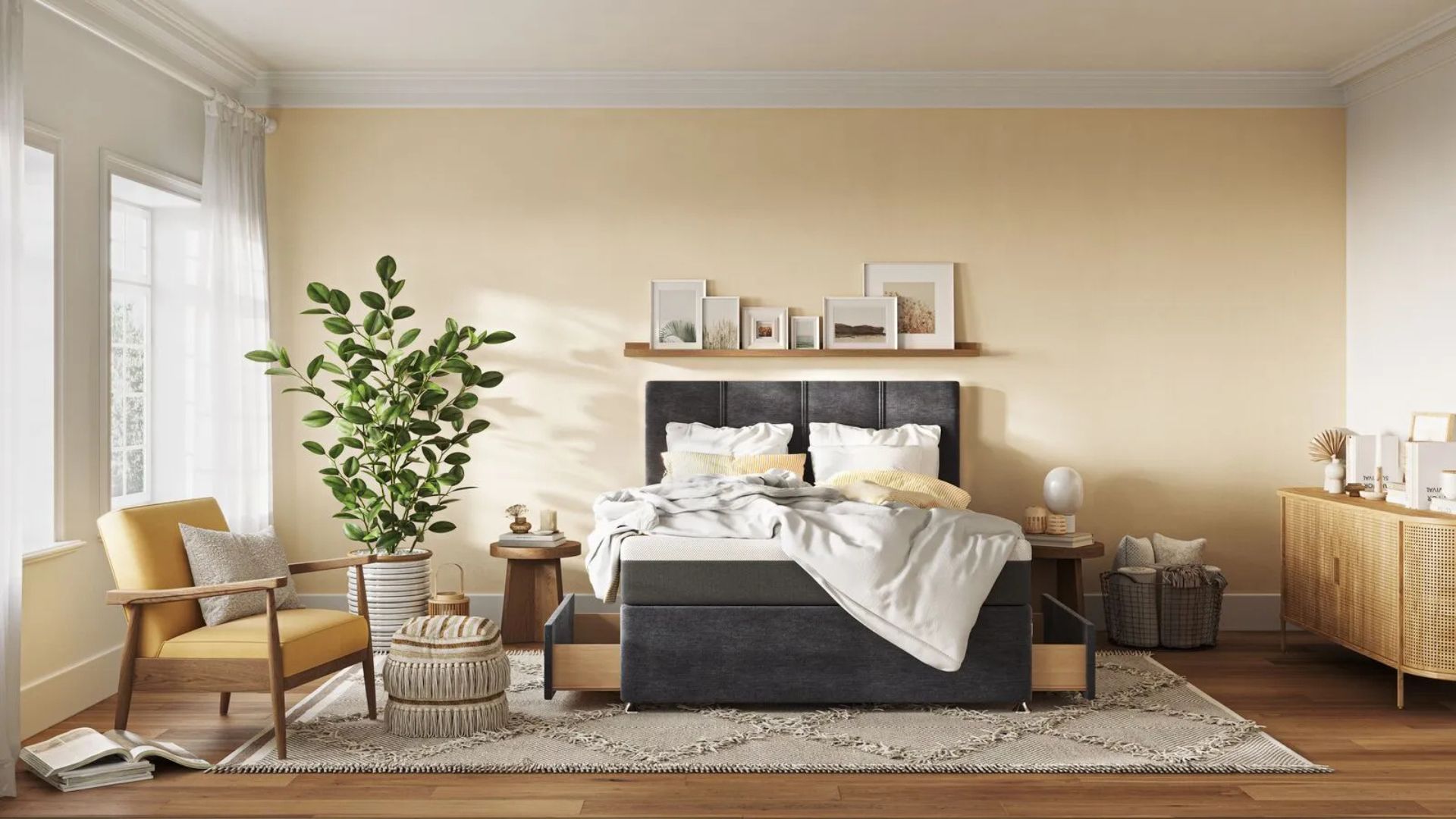 The Emma Divan Bed with a mattress and bedding made up in a yellow painted bright room