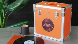 Orange vinyl storage box with records