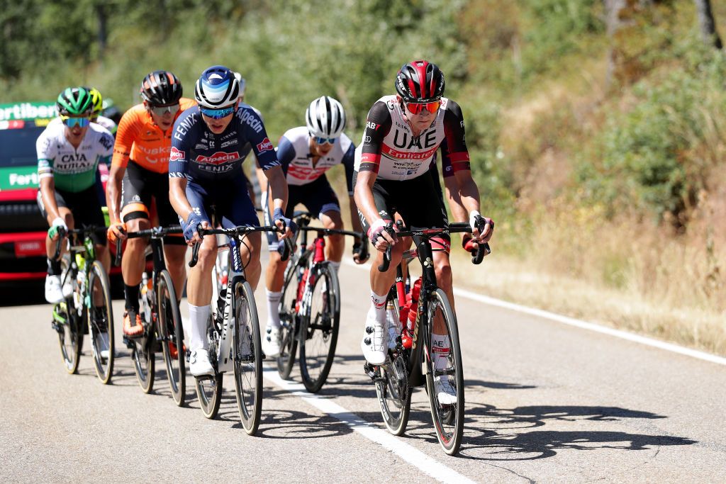 ESPINOSA DE LOS MONTEROS SPAIN AUGUST 16 LR Tobias Bayer of Austria and Team AlpecinFenix and Joseph Lloyd Dombrowski of United States and UAE Team Emirates compete in the breakaway during the 76th Tour of Spain 2021 Stage 3 a 2028km stage from Santo Domingo de Silos to Espinosa de los Monteros Picn Blanco 1485m lavuelta LaVuelta21 CapitalMundialdelCiclismo on August 16 2021 in Espinosa de los Monteros Spain Photo by Gonzalo Arroyo MorenoGetty Images