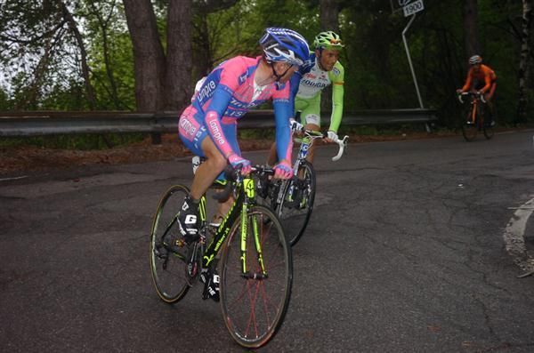 Ivan Basso keeps his countryman Damiano Cunego in his sights