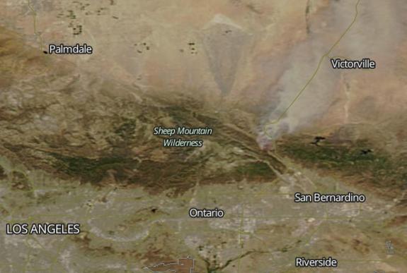This satellite image, taken by NASA's Aqua satellite just 3 hours after the Blue Cut fire was first reported on Aug. 16, shows a massive smoke plume rising just north of San Bernardino, California.