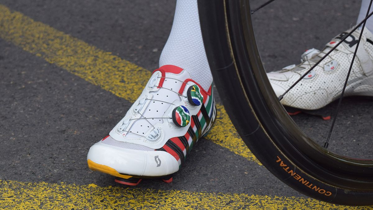 Daryl Impey has custom shoes from Scott to match his bike