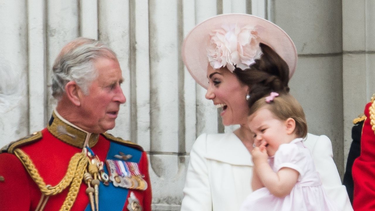 Prince Charles, Prince of Wales, Catherine, Duchess of Cambridge, Princess Charlotte, Prince George stand on the balcony