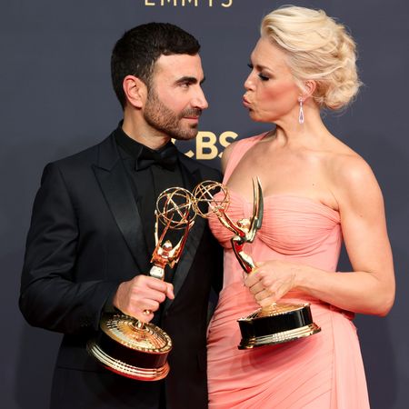 los angeles, california september 19 l r brett goldstein, winner of the outstanding supporting actor in a comedy series award for &lsquo;ted lasso,&rsquo; and hannah waddingham, winner of the outstanding supporting actress in a comedy series award for &lsquo;ted lasso,&rsquo; pose in the press room during the 73rd primetime emmy awards at la live on september 19, 2021 in los angeles, california photo by rich furygetty images
