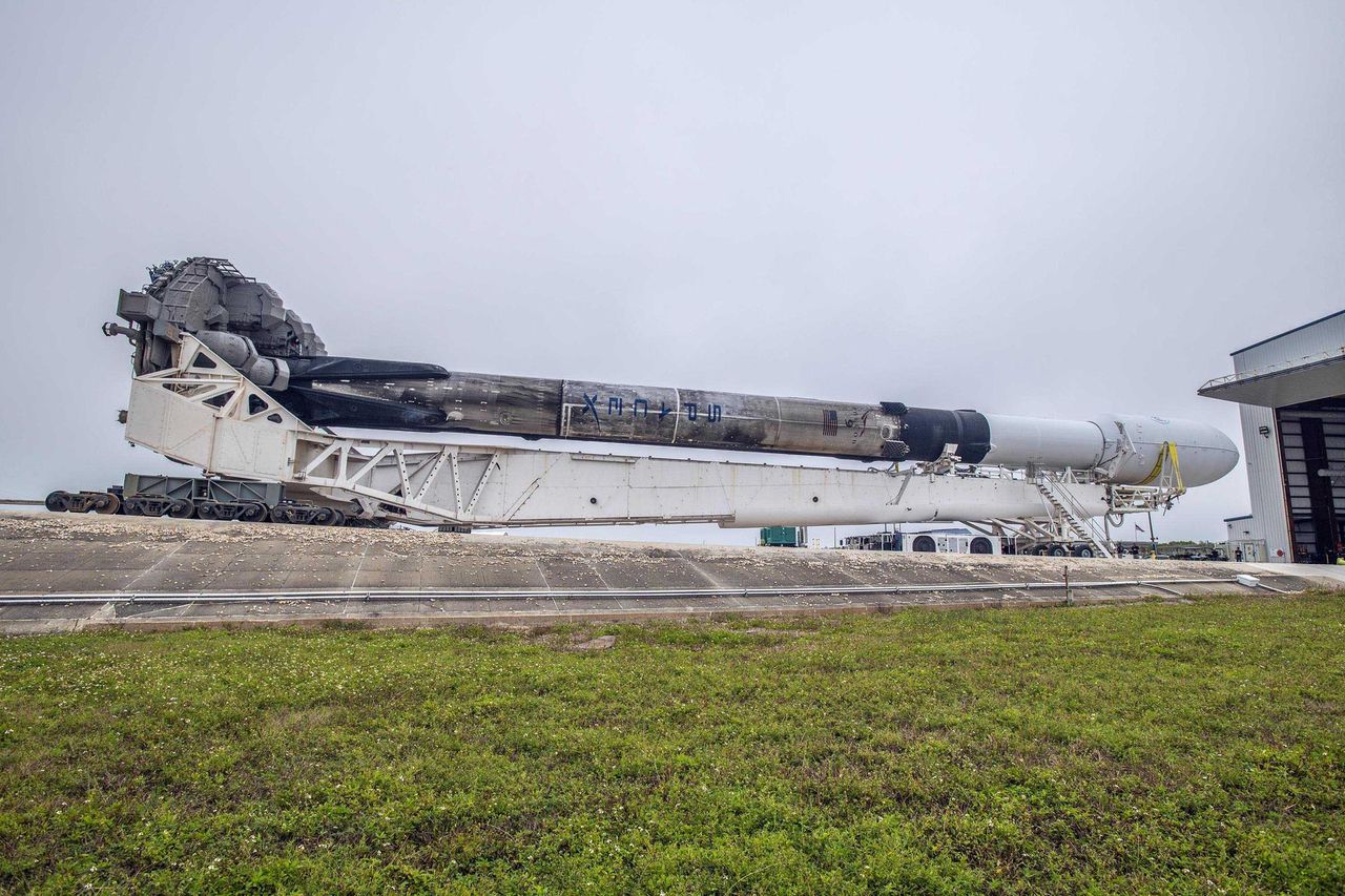 A SpaceX Falcon 9 rocket with NASA&rsquo;s Imaging X-ray Polarimetry Explorer (IXPE) spacecraft, rolls out to Launch Complex 39A at NASA&rsquo;s Kennedy Space Center in Florida, on Dec. 7, 2021.