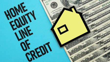 The words "Home equity line of credit" displayed next to an icon of a house and money