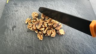 chopping walnuts for the air fryer filo pastry baklava bites