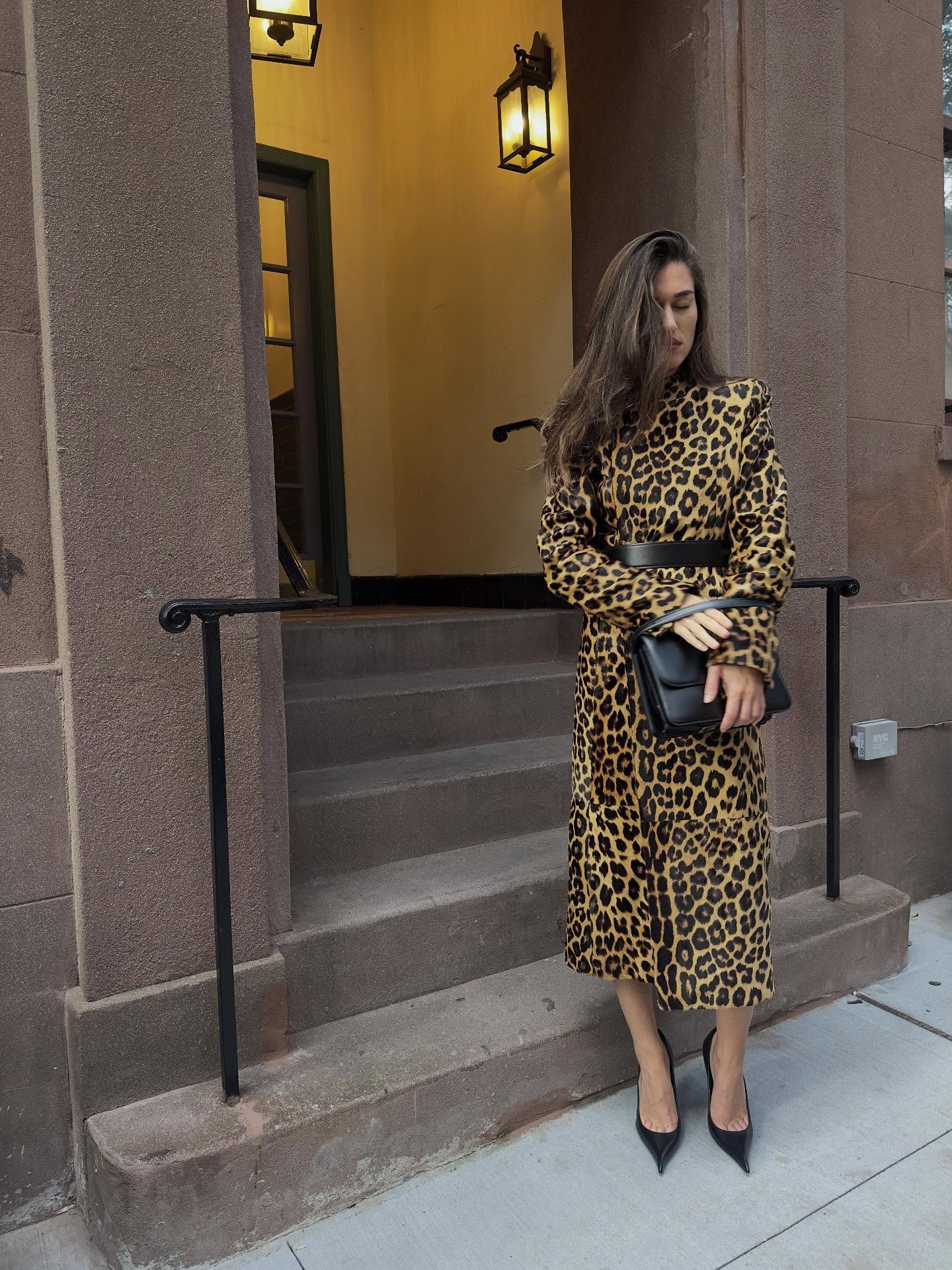 @iliridakrasniqi wearing a leopard-print pony hair coat with a belt.