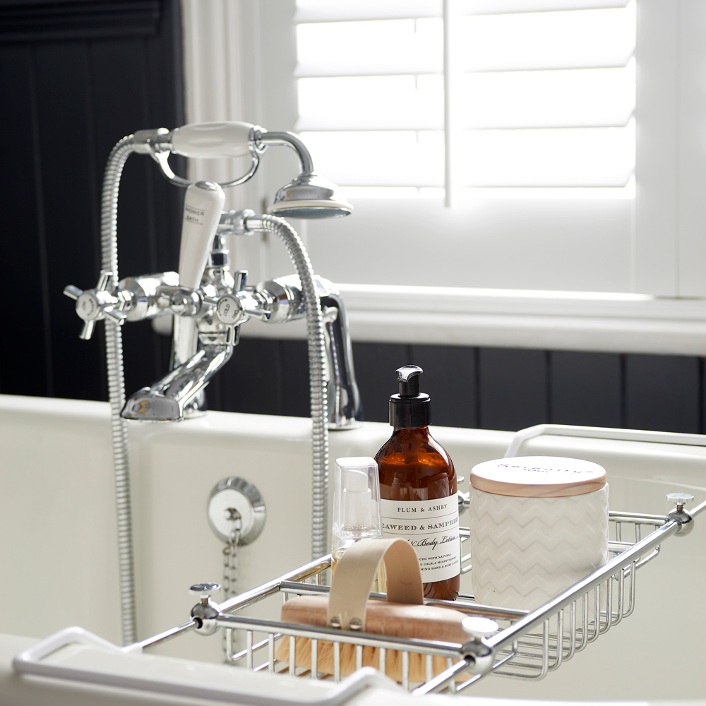 bathroom with handshower and white window
