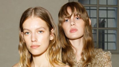 Fair skinned models pose backstage at the Ermanno Scervino Fashion Show during the Milan Fashion Week Womenswear Spring/Summer 2023 on September 24, 2022 in Milan, Italy.