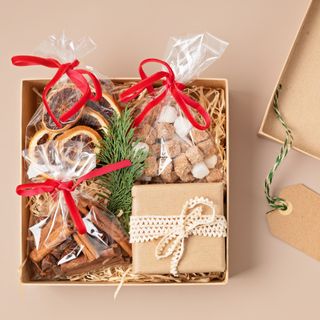 Gift box filled with festive treats and snacks