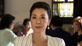 Michelle Yeoh looks concerned in the movie Crazy Rich Asians