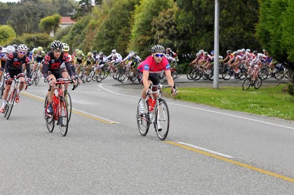 The peloton led by Jason Christie of Calder Stewart have the break under control.