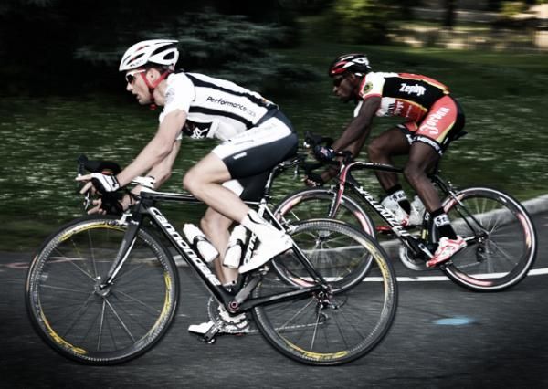 John Loehner (Axa Equitable Cycling Team) makes a move on Jermaine Burrowes (Dave Jordan Coaching-Zephyr Graffiti) while rounding a corner.
