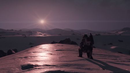 Starfield player kneeling on planet looking at sunset
