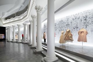 Christian Dior Designer of Dreams exhibition installation view, among current NYC fashion exhibitions