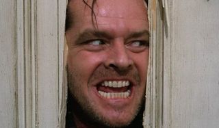 The Shining Jack Nicholson peeking out menacingly through the bathroom door