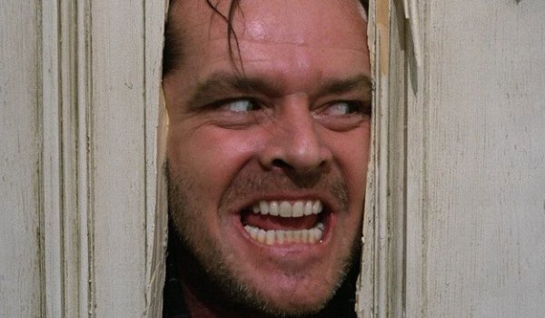 The Shining Jack Nicholson peeking out menacingly through the bathroom door