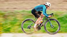 Cannondale SuperX 2025 gravel bike being raced by a cyclist