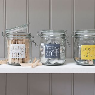 storage jars with white shelves