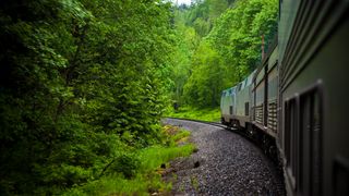 The Empire Builder Train rolling through Glacier National Park in Montana