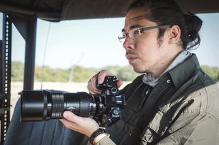 The Olympus OM-D E-M1X pro camera mounted with an Olympus M.Zuiko 300mm f/4 IS Pro lens