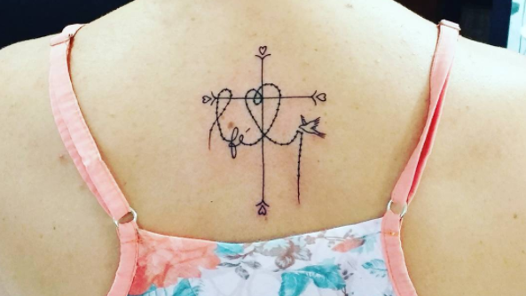 Pretty cross tattoo