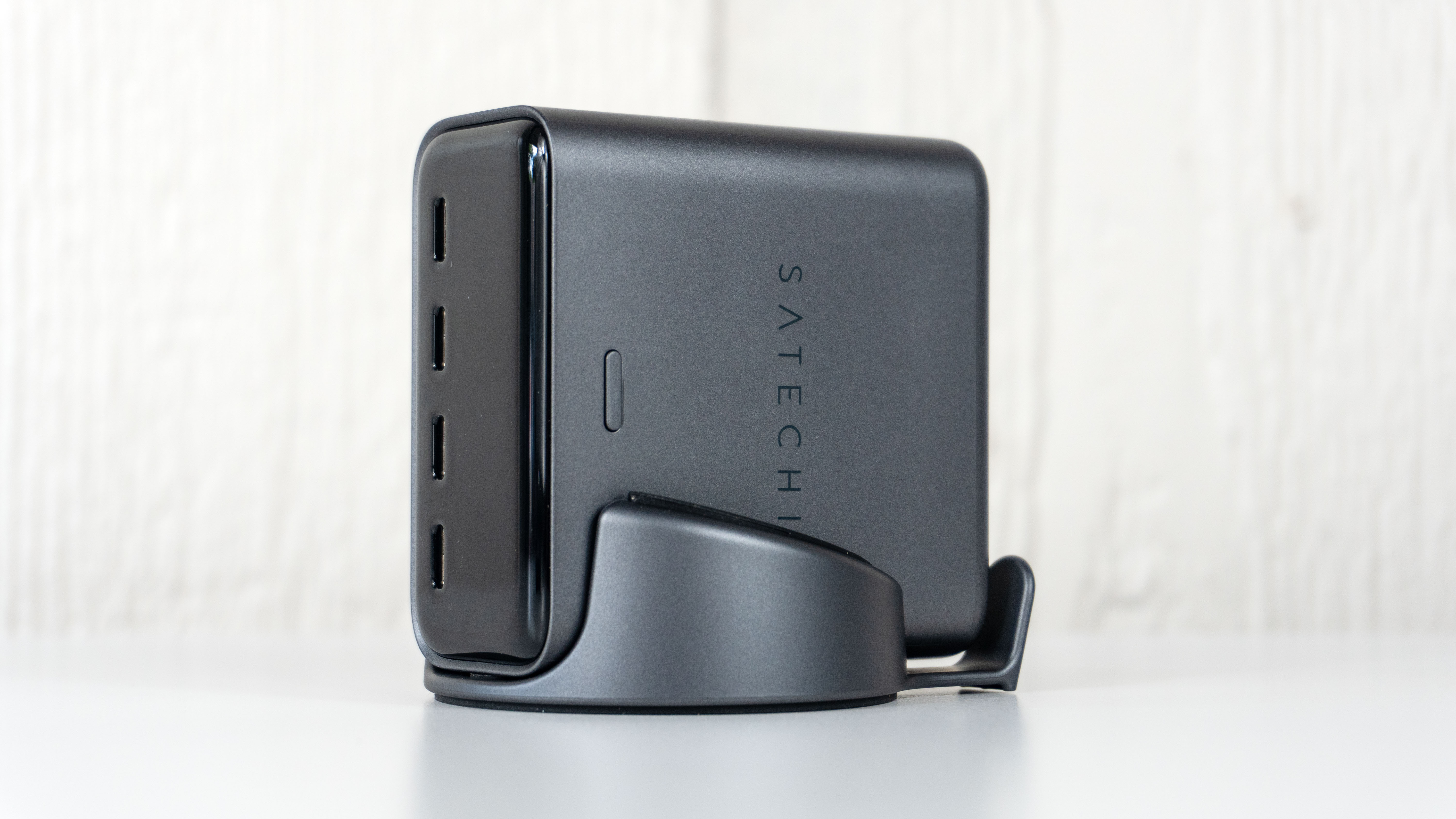 The Satechi ChargeView 140W Desktop Charger in a vertical orientation in its included stand