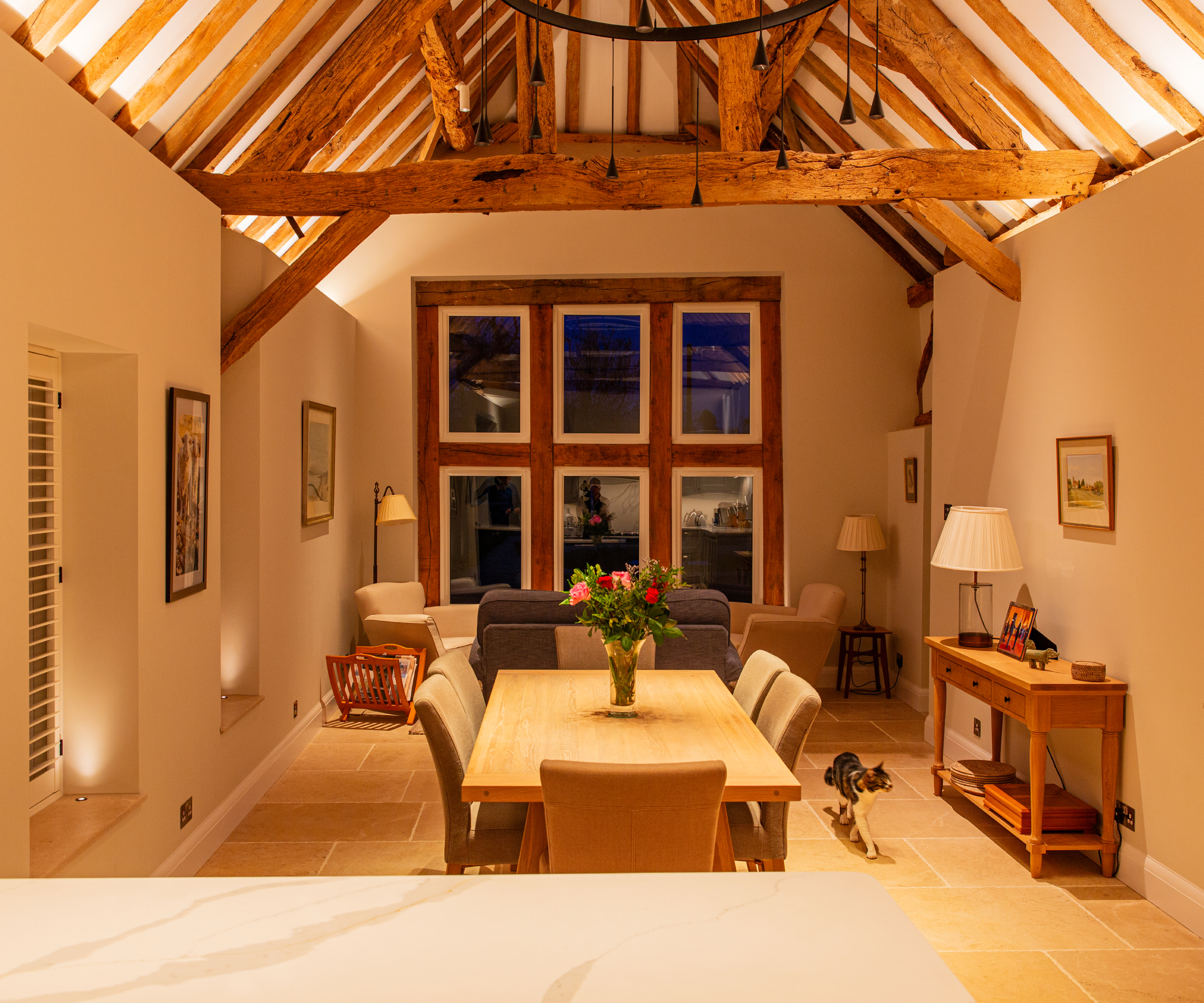 dining room with vaulted ceiling showing oak frame and beams
