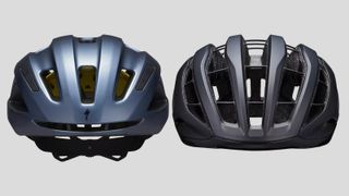 A Specialized Align II cheap helmet next to a Prevail III expensive helmet