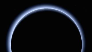 Pluto's blue haze, produced by back-scattering from small particles in the atmosphere in a process known as Mie scattering.