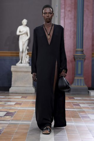 a runway model walks the Valentino spring 2024 runway