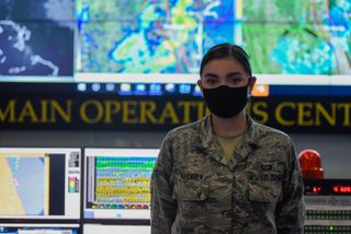 Airman 1st Class Hannah Mulcahey, the duty forecaster for the upcoming SpaceX Starlink launch, scheduled for June 13, 2020.