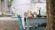 outdoor table laid with food in italian village
