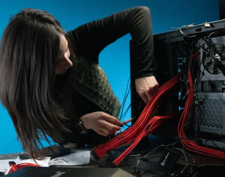 Brunette woman building custom PC