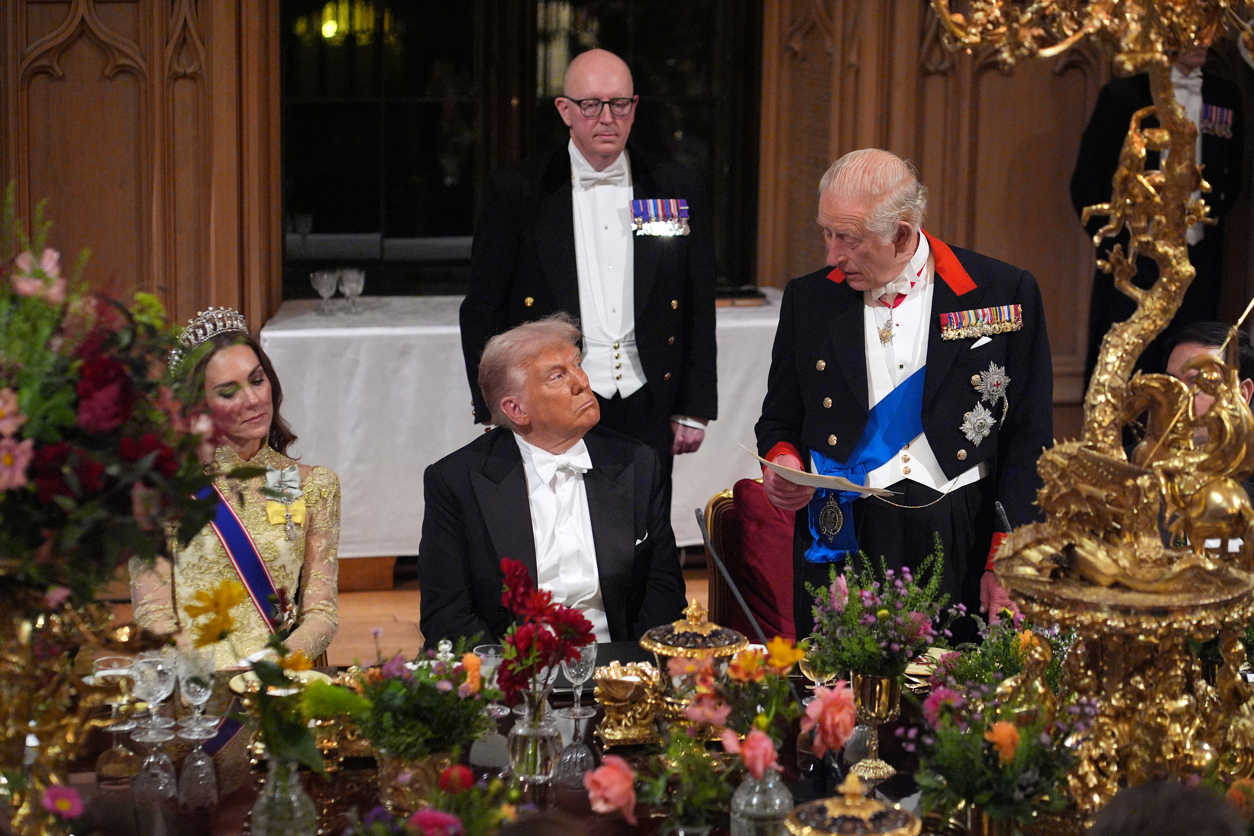 WINDSOR, ENGLAND - SEPTEMBER 17: King Charles III delivers his speech as US President Donald Trump and Catherine, Princess of Wales listen during a State Banquet at Windsor Castle for the State visit by the President of the United States of America on September 17, 2025 in Windsor, England. President Trump is in England from Sept. 16-18 on his second UK state visit, with the previous one taking place in 2019 during his first presidential term. (Photo by Yui Mok - WPA Pool/Getty Images)