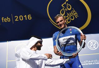Marcel Kittel collects the trophy for his overall victory at the 2016 Dubai Tour