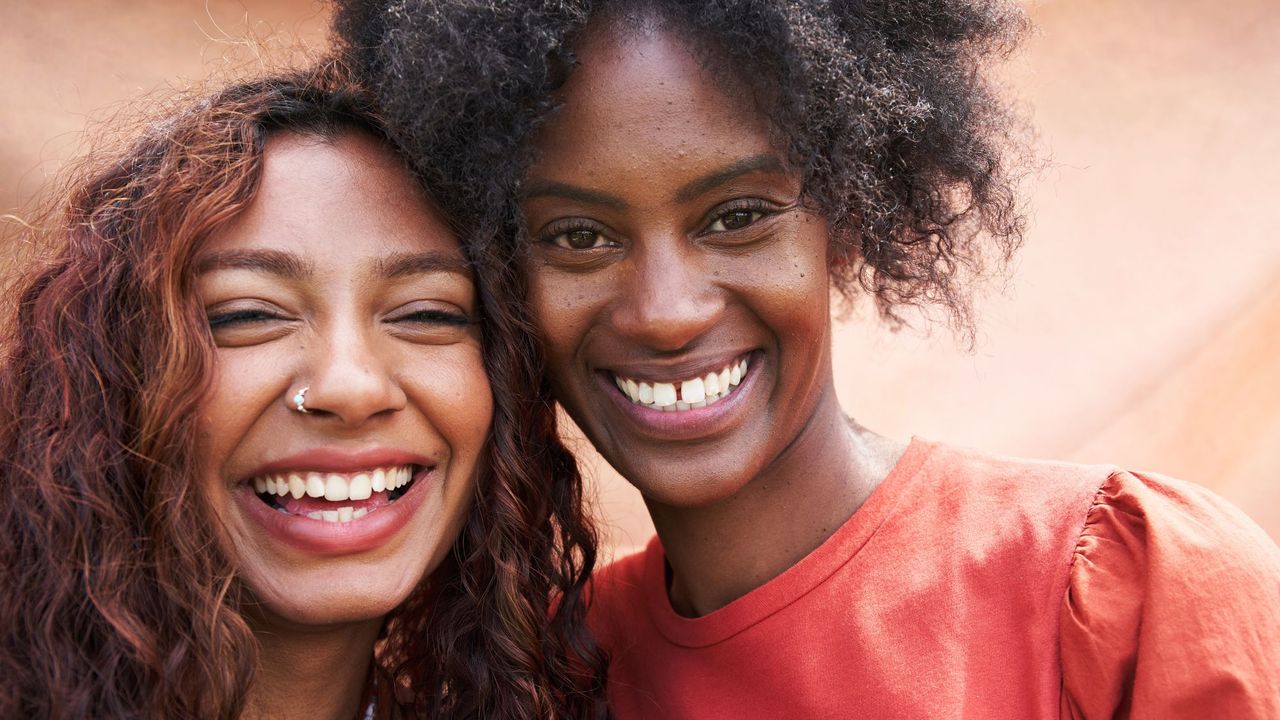 a picture of two women smiling - vegan skincare brands