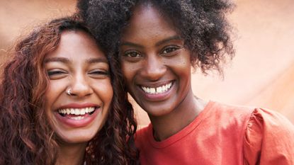 a picture of two women smiling - vegan skincare brands