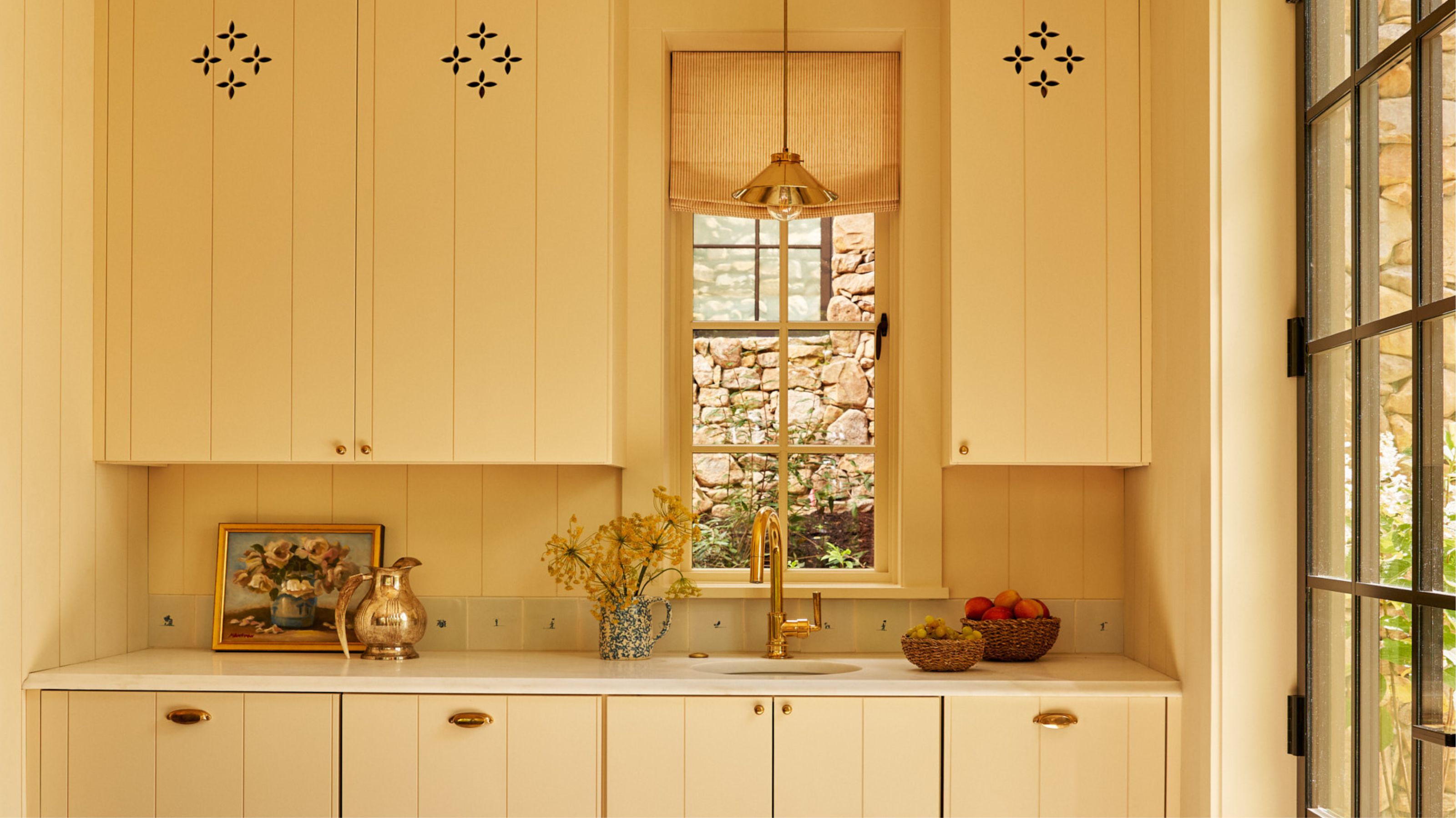 A kitchen painted in Farrow &amp; Ball's Matchstick