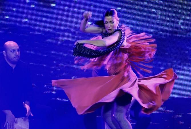 A flamenco dancer and musicians perform during the 2014 Vuelta presentation