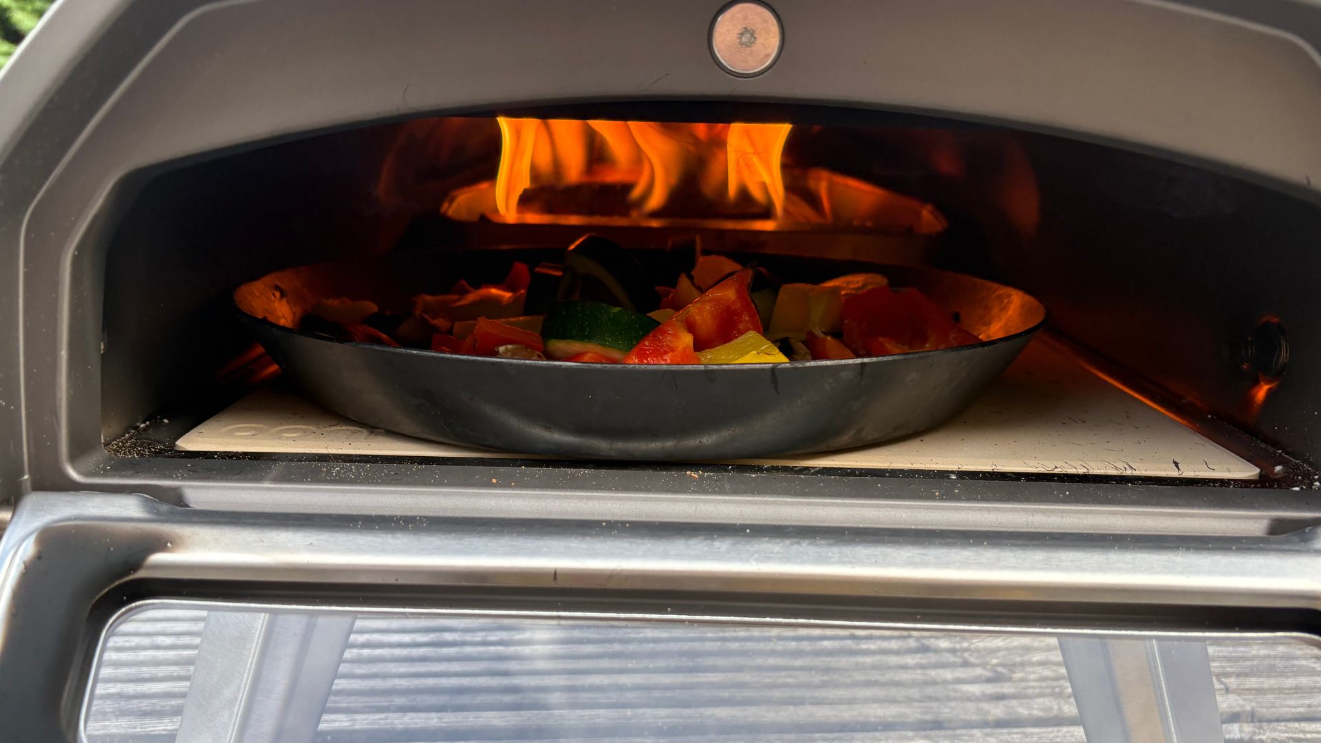 Cooking vegetables in a skillet in the Ooni Karu 12 2nd Generation