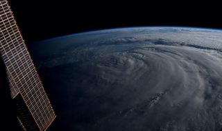 "#Neoguri has been literally cut in half. Unreal," wrote NASA's Reid Wiseman from the International Space Station July 8.