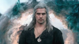 Henry Cavill as Geralt of Rivia in The Witcher season 3, with a cloud of smoke behind him