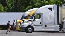 A truck driver walks to his vehicle in Albany, New York.