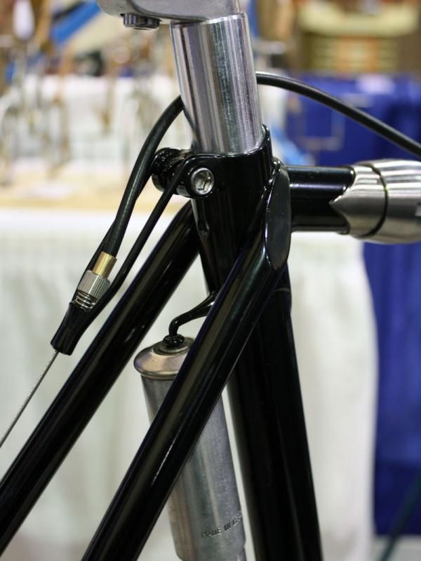 The svelte rear brake housing stop on this Banjo Cycles tourer is neatly brazed to the back of the seat lug.