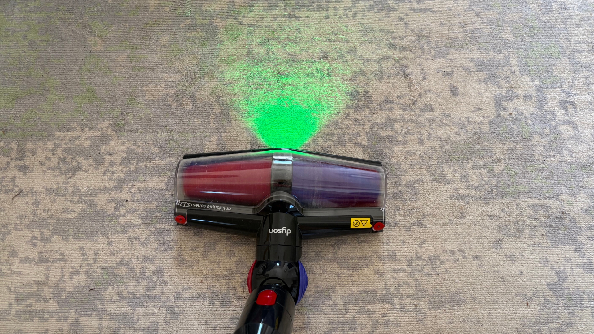 Testing the Dyson V10 Konical Cordless Vacuum showing it vacuuming the floor