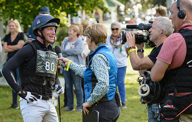 In demand: Clare Balding speaks to Oliver Townend as he soars to the top of the leaderboard post-cross-country